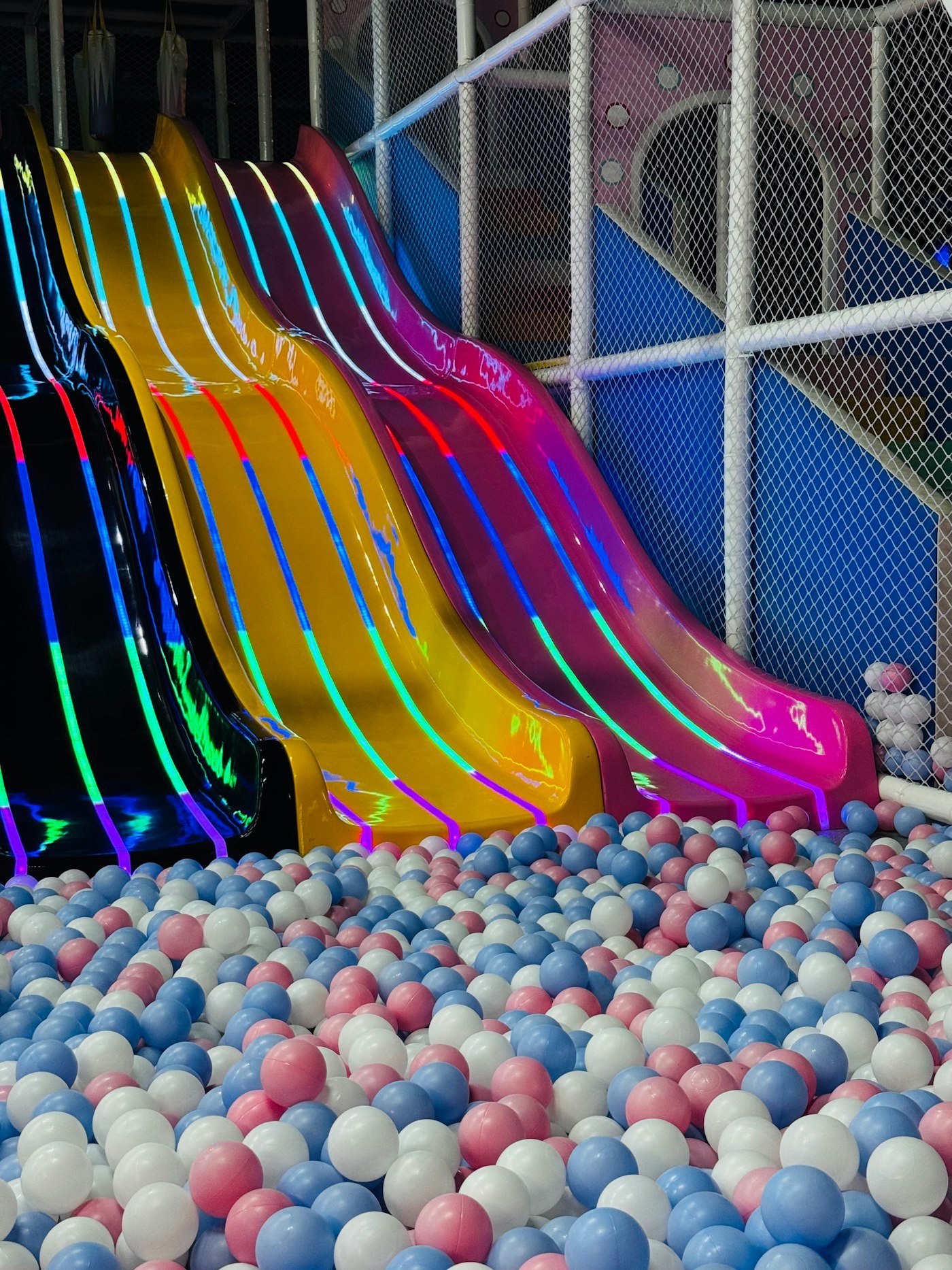 Slides into the ball pit